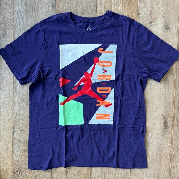 Jordan Men’s Purple Short-Sleeve Graphic Tee with Red, Orange, and Green Accents - Picture 1 of 4